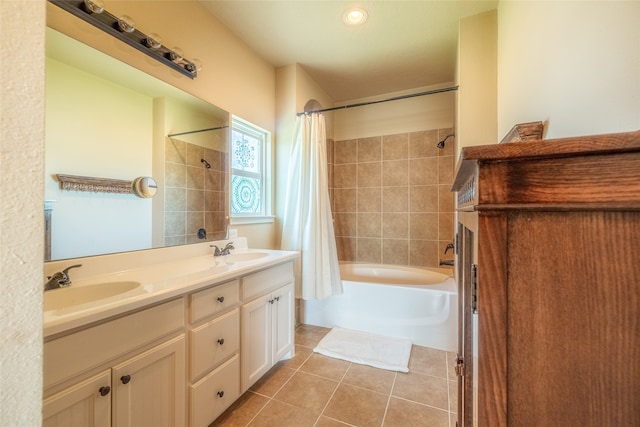 bathroom with double vanity, shower / bath combination with curtain, and tile patterned floors