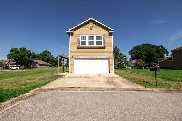 front facade with a garage and a front yard