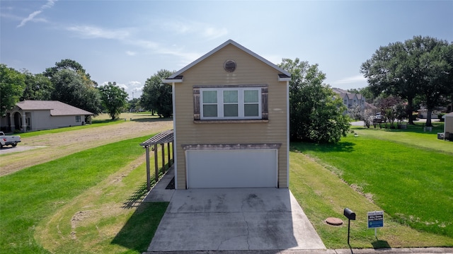 view of front of property featuring a garage and a front yard