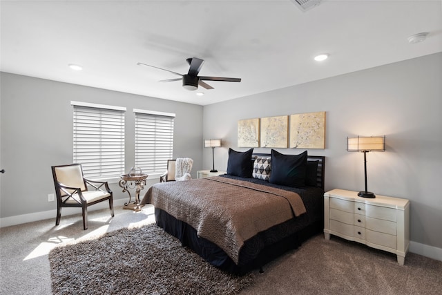 bedroom with dark colored carpet and ceiling fan