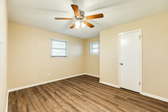 unfurnished bedroom featuring hardwood / wood-style floors and ceiling fan