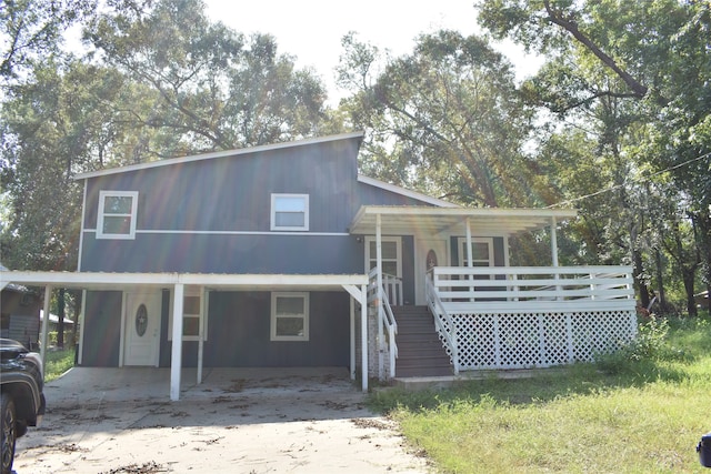 view of front of home featuring a carport