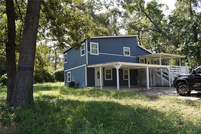 view of front of house with central AC unit