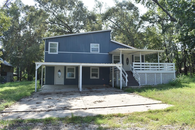 view of front of home with a carport