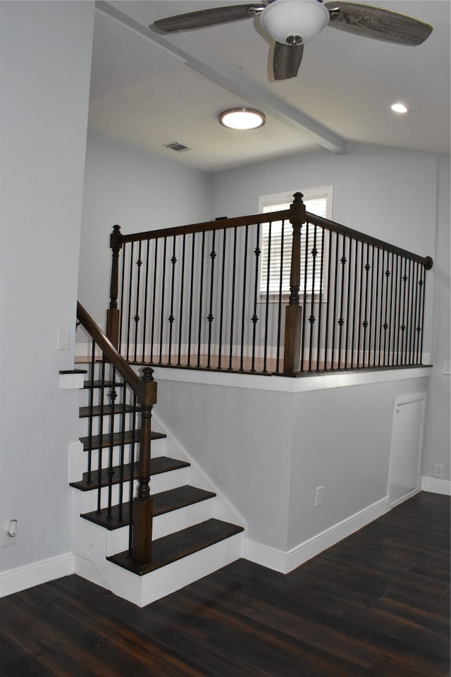 stairway with ceiling fan and hardwood / wood-style flooring