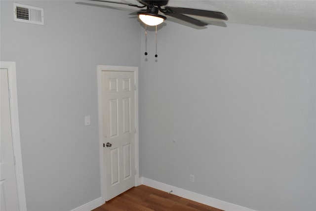 empty room featuring hardwood / wood-style floors and ceiling fan