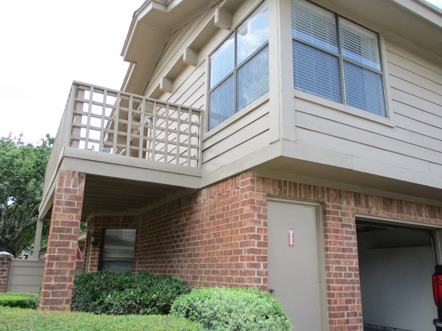 view of property exterior featuring a balcony