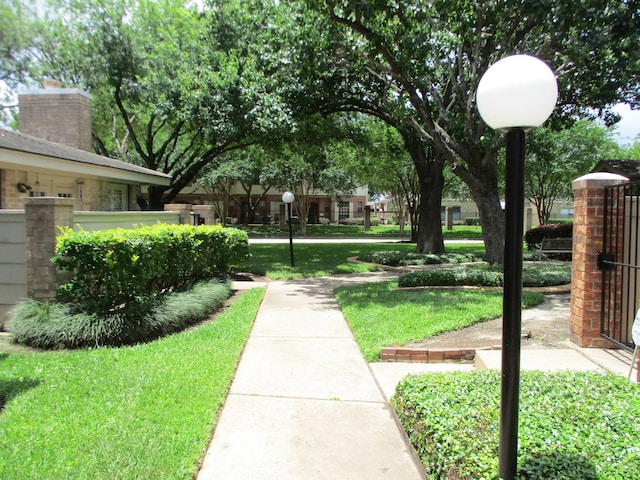 surrounding community featuring a yard