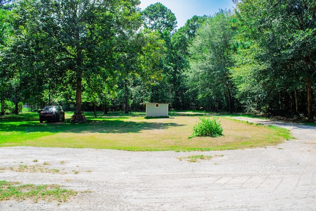 exterior space featuring a storage shed