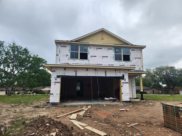 property in mid-construction with a garage