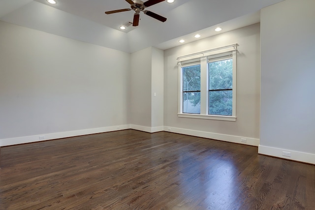 empty room featuring ceiling fan and dark hardwood / wood-style flooring