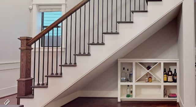 stairway with wood-type flooring