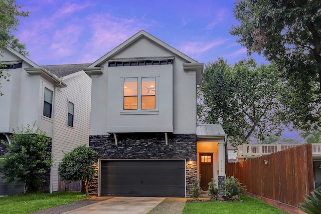 view of front of property featuring a garage