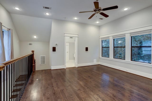 interior space featuring ceiling fan, wood-type flooring, and lofted ceiling