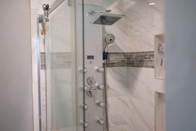 bathroom featuring a stall shower