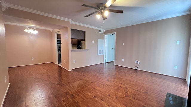 unfurnished living room with ceiling fan with notable chandelier, hardwood / wood-style flooring, and crown molding