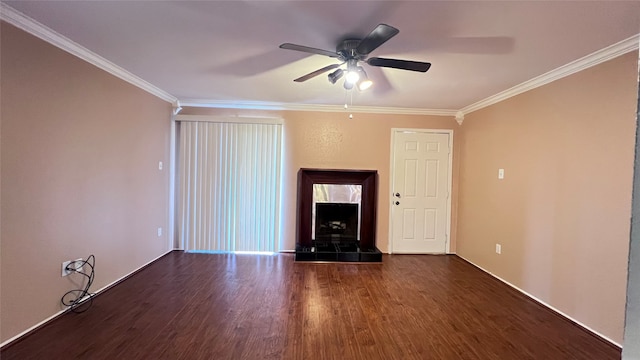 unfurnished living room featuring ceiling fan, dark wood-type flooring, and crown molding