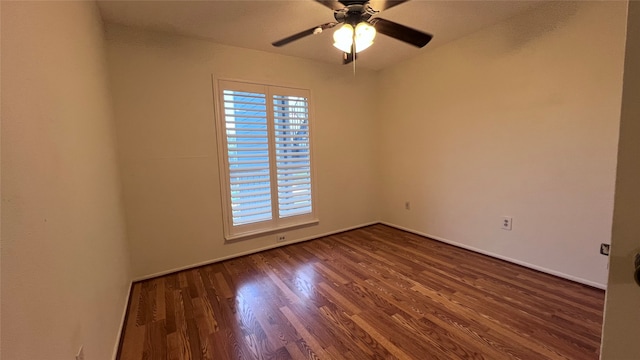 spare room featuring ceiling fan and wood-type flooring