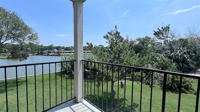 balcony featuring a water view