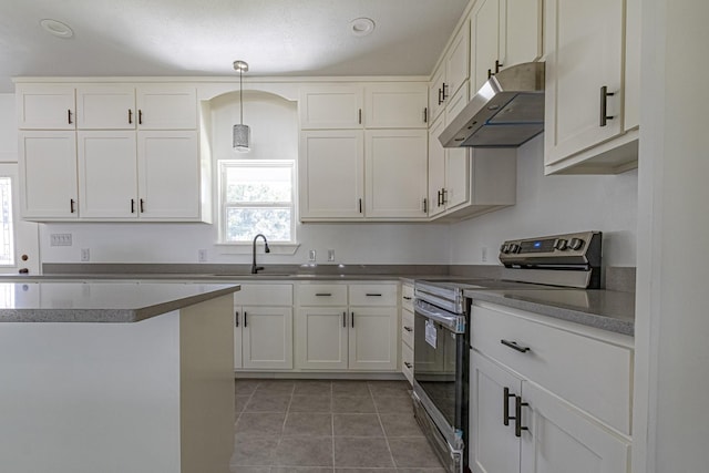 kitchen with pendant lighting, sink, electric range, white cabinets, and tile patterned floors