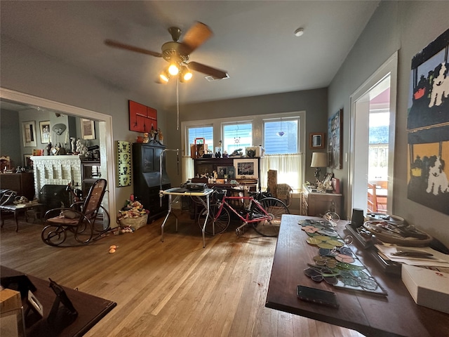 interior space featuring ceiling fan and light wood-type flooring