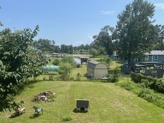 view of yard with a shed