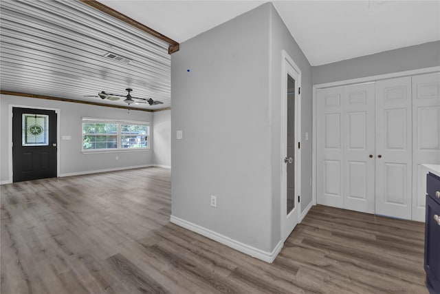 interior space featuring hardwood / wood-style floors and ceiling fan