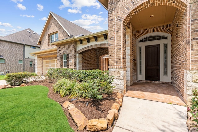 doorway to property featuring a garage