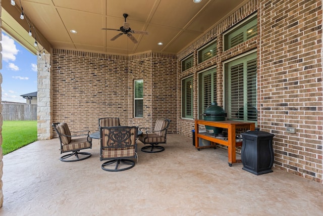 view of patio / terrace featuring ceiling fan