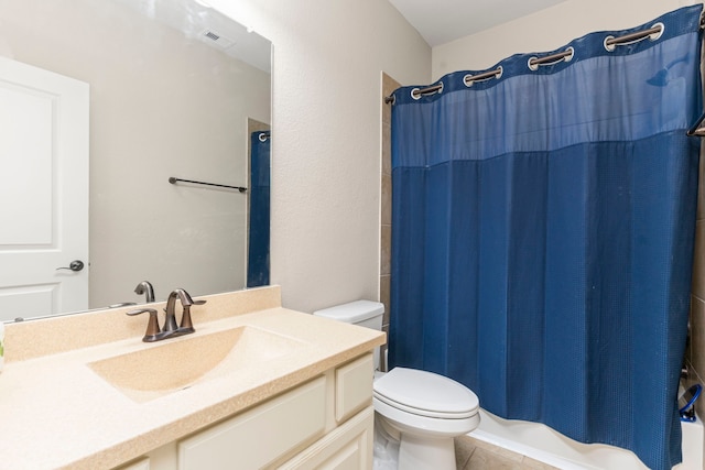 full bathroom featuring tile patterned floors, vanity, toilet, and shower / tub combo with curtain