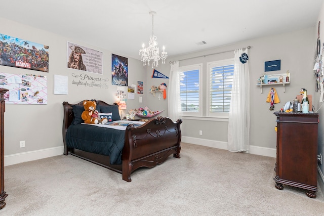 bedroom featuring light colored carpet and a chandelier