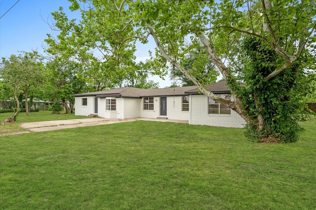 ranch-style house with a front lawn