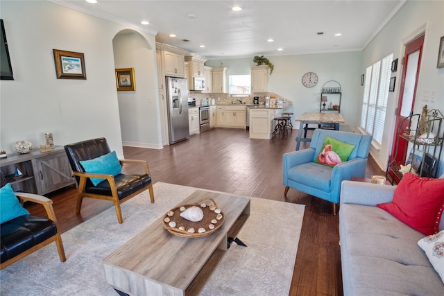 living room with plenty of natural light and wood-type flooring