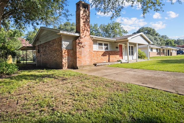 ranch-style home with a front lawn