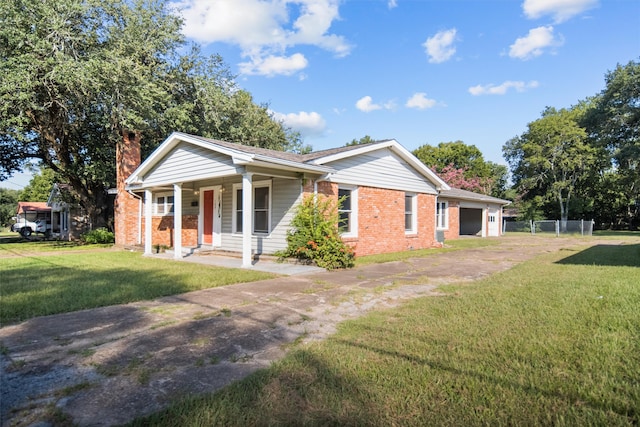 single story home featuring a front yard and covered porch