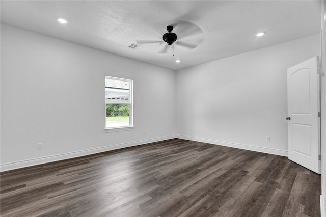 spare room with ceiling fan and hardwood / wood-style flooring