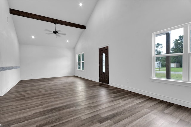 unfurnished living room featuring beamed ceiling, hardwood / wood-style floors, ceiling fan, and high vaulted ceiling