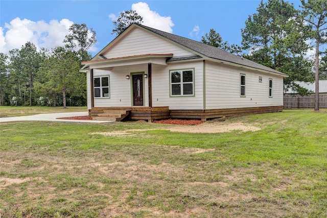 view of front of property with a front lawn