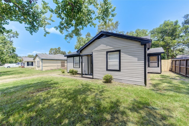 exterior space with a front lawn