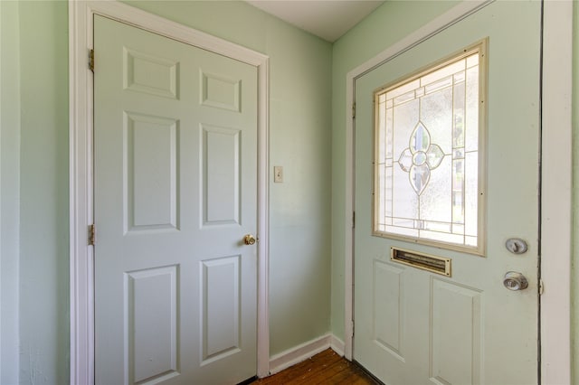 entryway featuring dark wood-type flooring