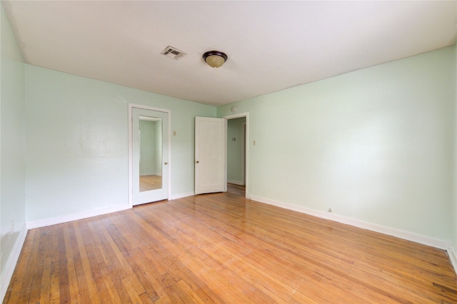 empty room featuring light hardwood / wood-style floors