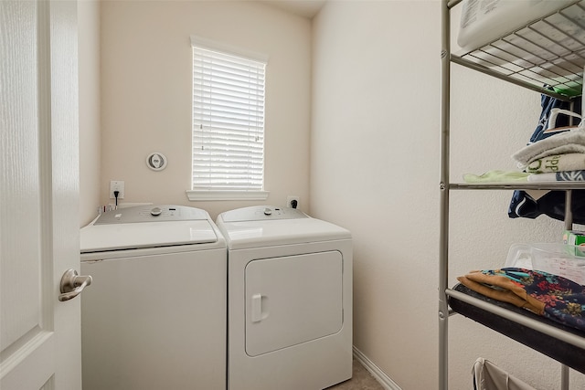 washroom with washer and clothes dryer