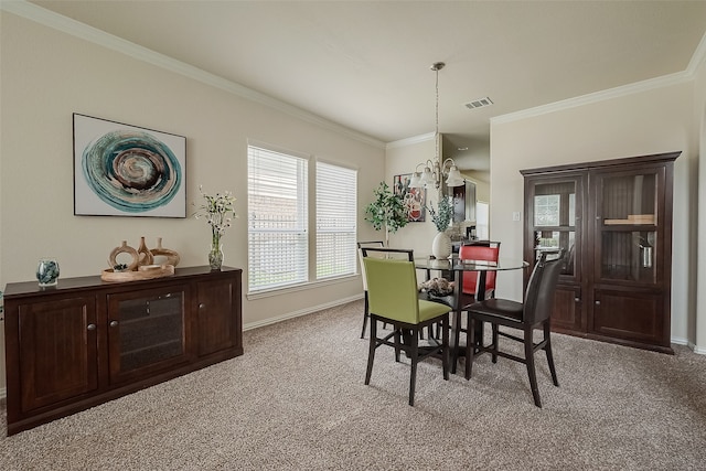 dining area with light carpet, a chandelier, and crown molding