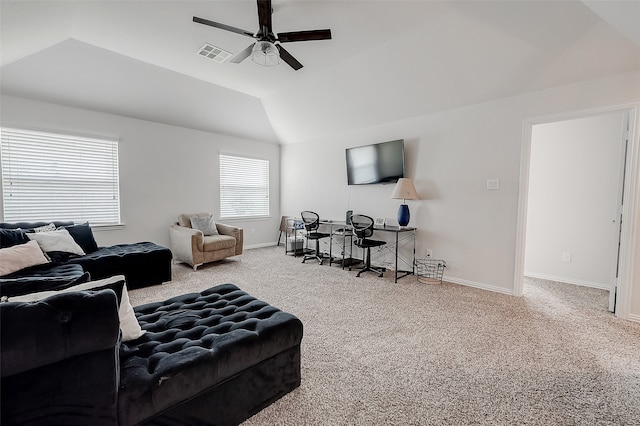 carpeted living room featuring vaulted ceiling and ceiling fan