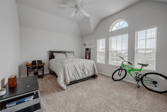 carpeted bedroom with vaulted ceiling and ceiling fan