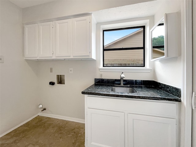 laundry room featuring gas dryer hookup, cabinets, washer hookup, and sink