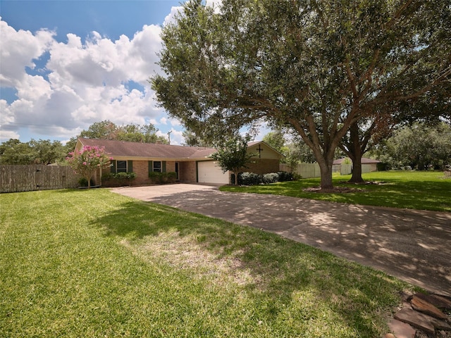 ranch-style home featuring a garage and a front lawn