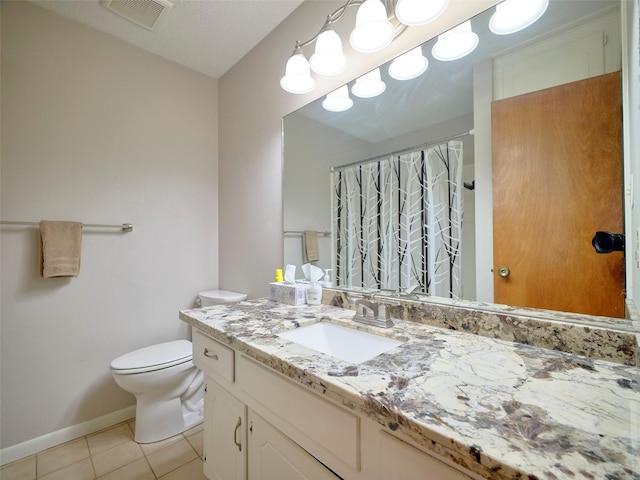 bathroom with tile patterned floors, toilet, a shower with shower curtain, and vanity