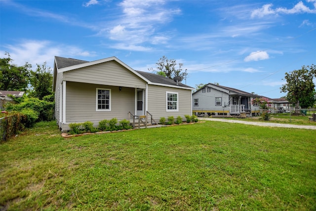 view of front facade with a front yard