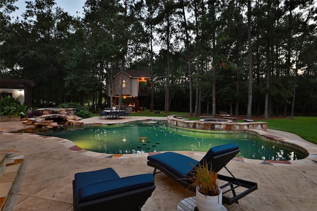 view of pool with a patio and a jacuzzi